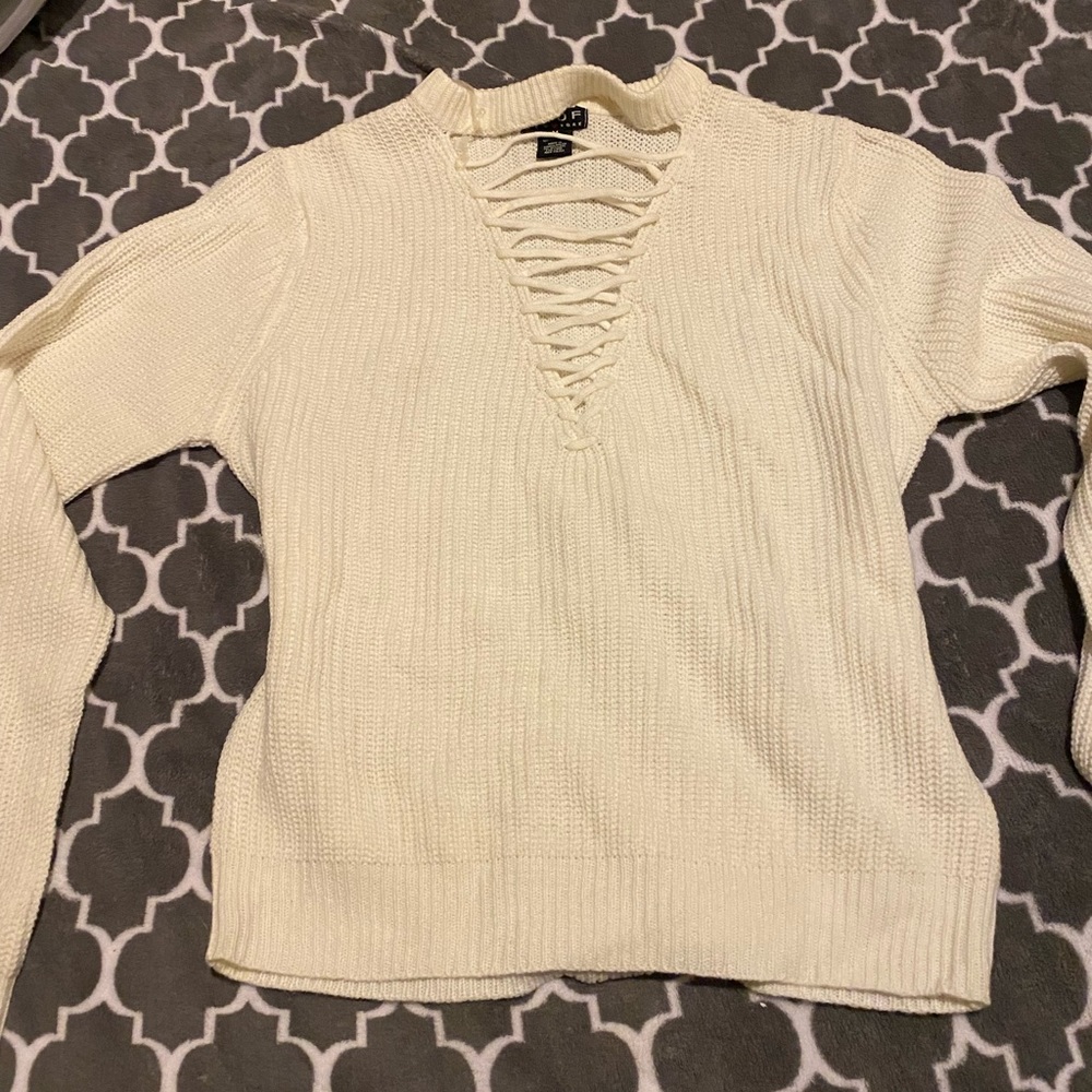 Cross cross lace up sweater